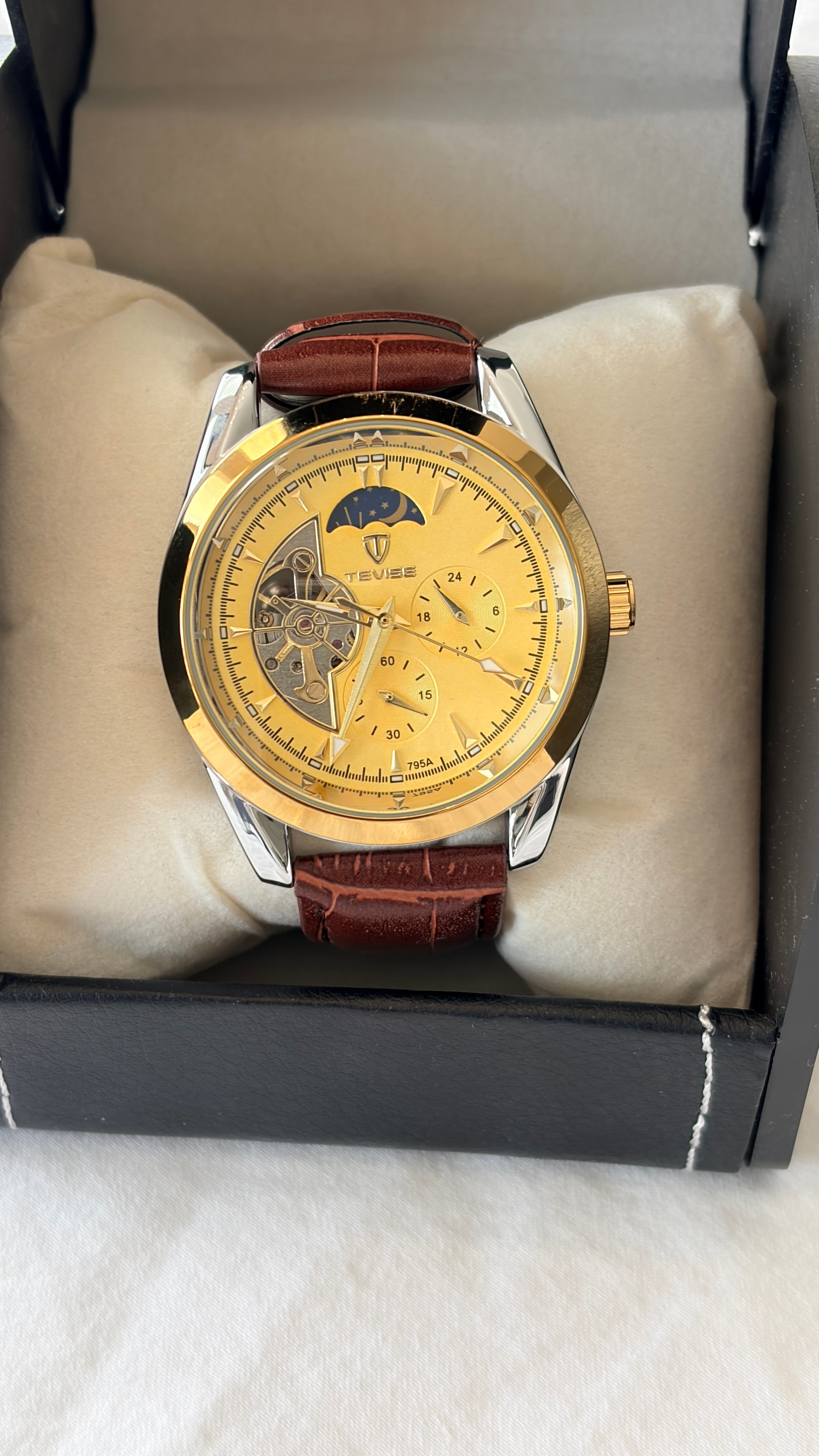 Tevise moon phase skeleton watch gold dial brown leather strap