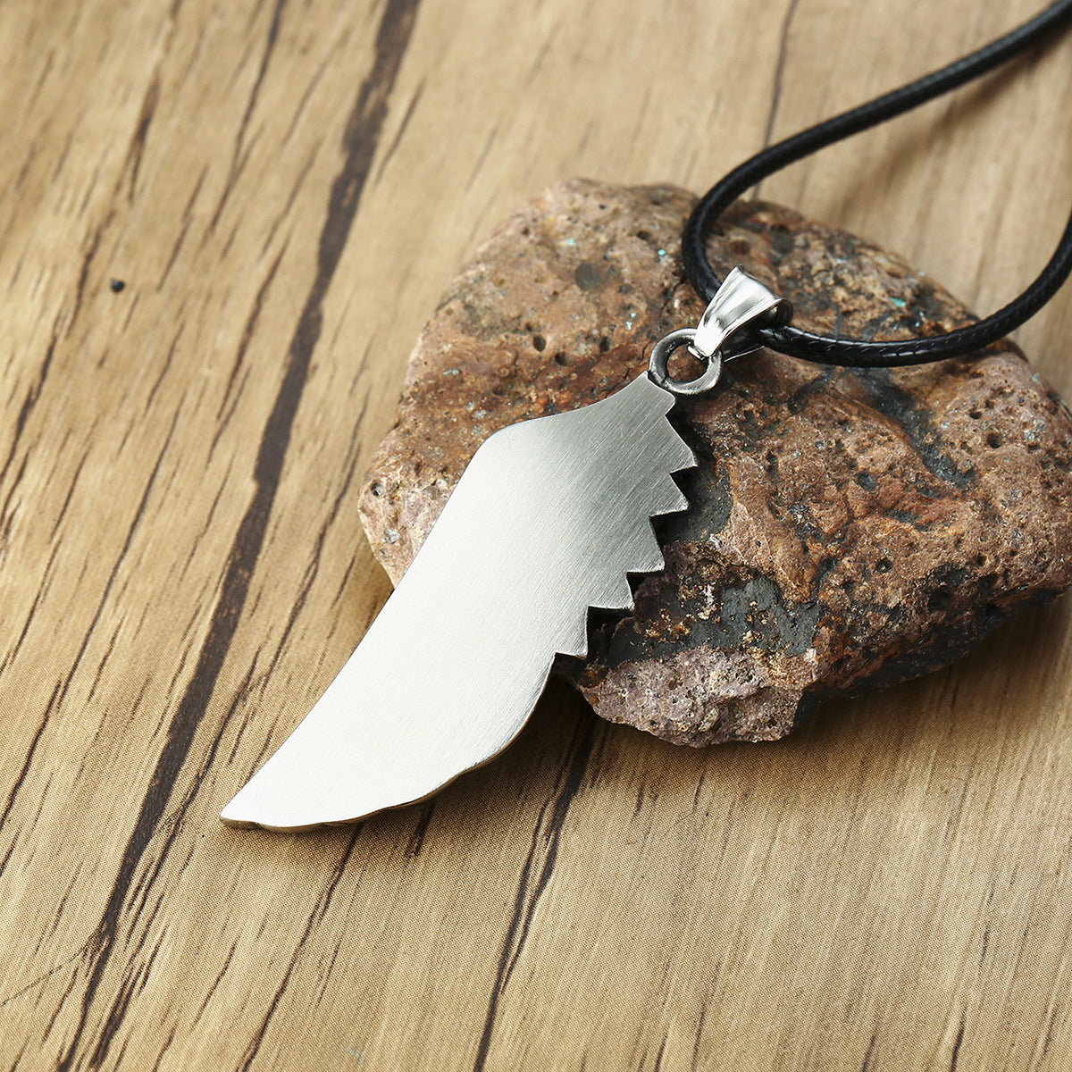 Stainless steel left wing casting pendant